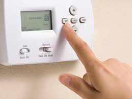 Lower your utilities bills by getting a programmable thermostat.