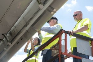 Researchers count insect residue on the wing of the ecoDemonstrator 757 aircraft. Photographer: Paul Bagby/NASA Langley
